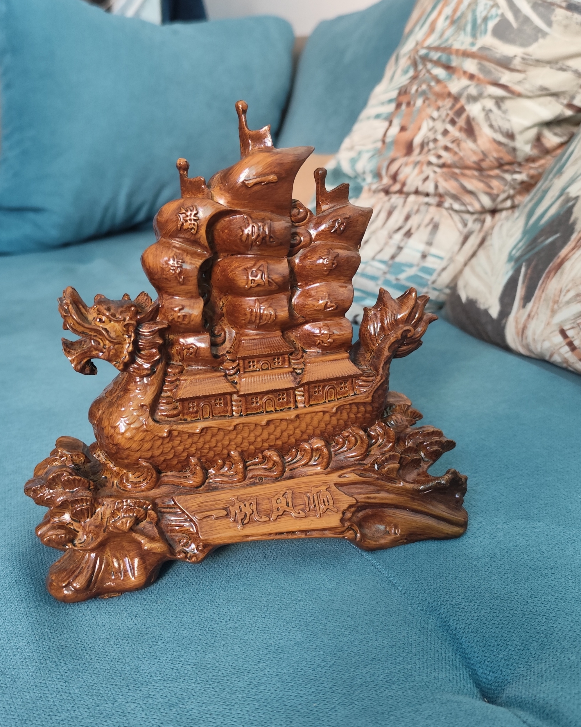 Chinese sail detail on handcrafted Feng Shui Dragon Ship figurine