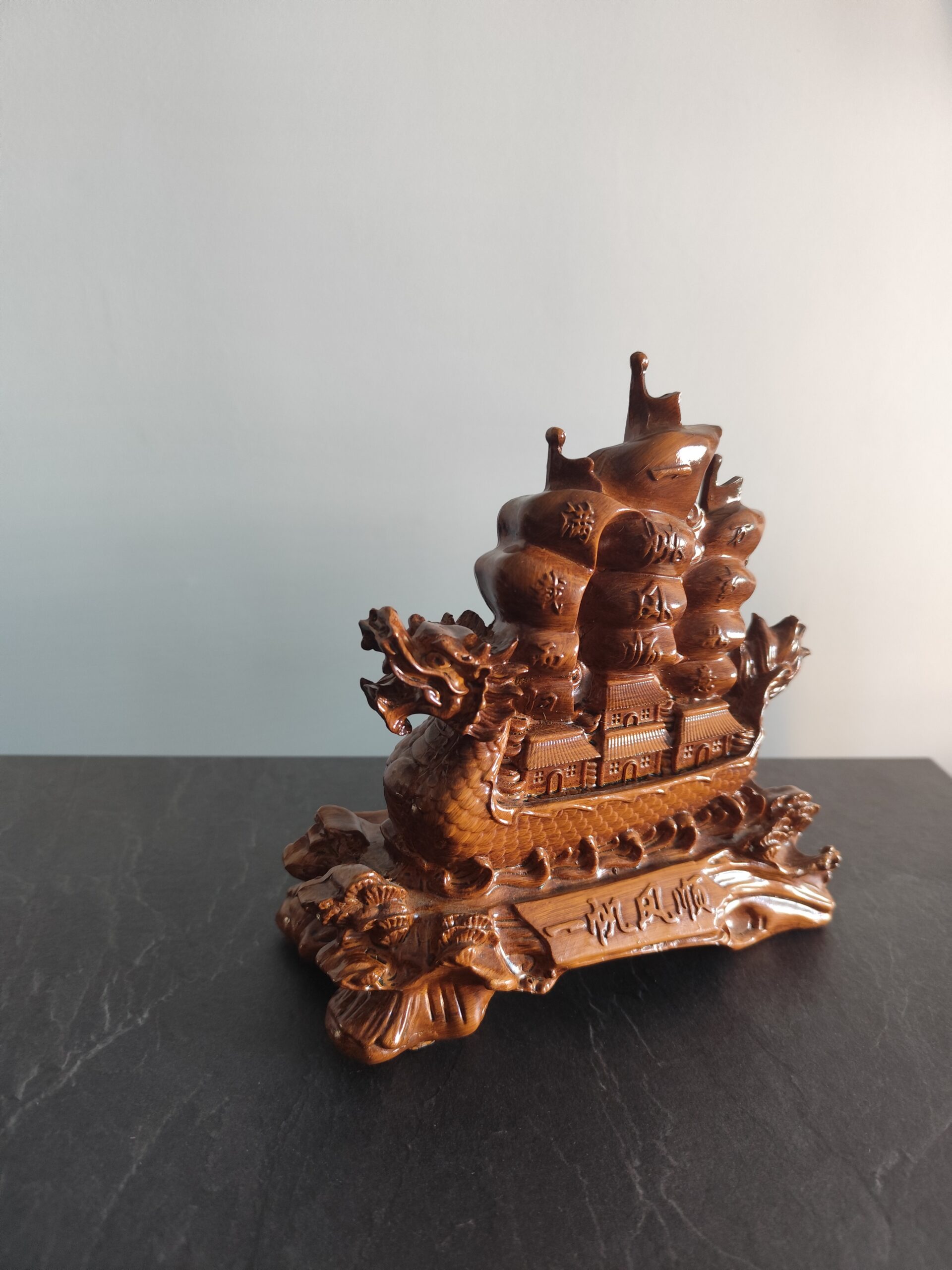 Side view of handcrafted Feng Shui Dragon Ship figurine