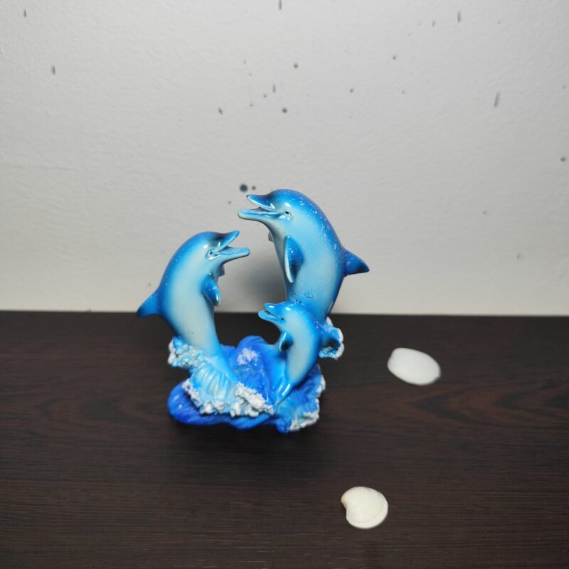 Small turquoise dolphin figurine with two dolphins and blue ocean waves, 9.5 × 9.5 cm