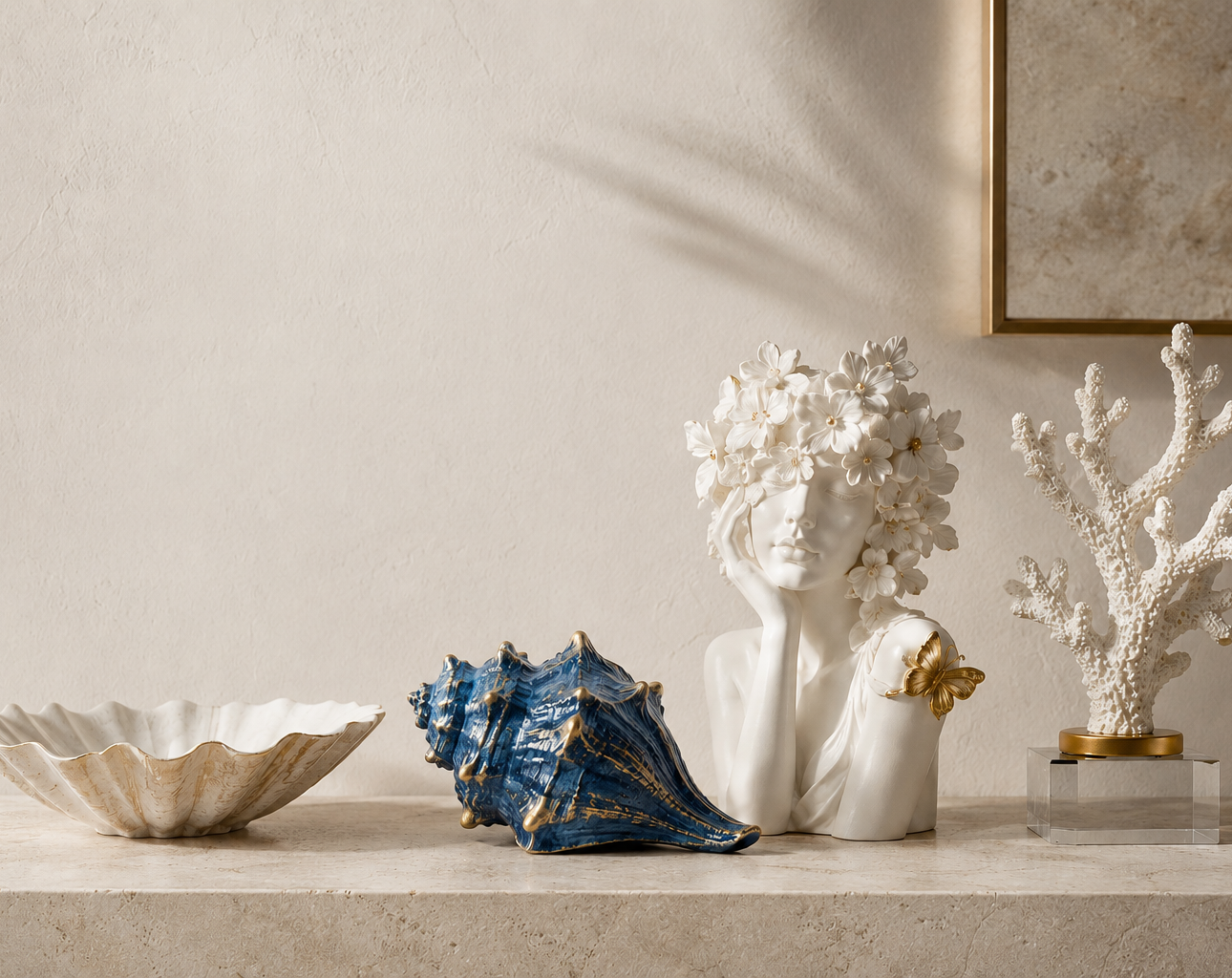 Resin figurines and decorative sculptures styled in an elegant interior setting