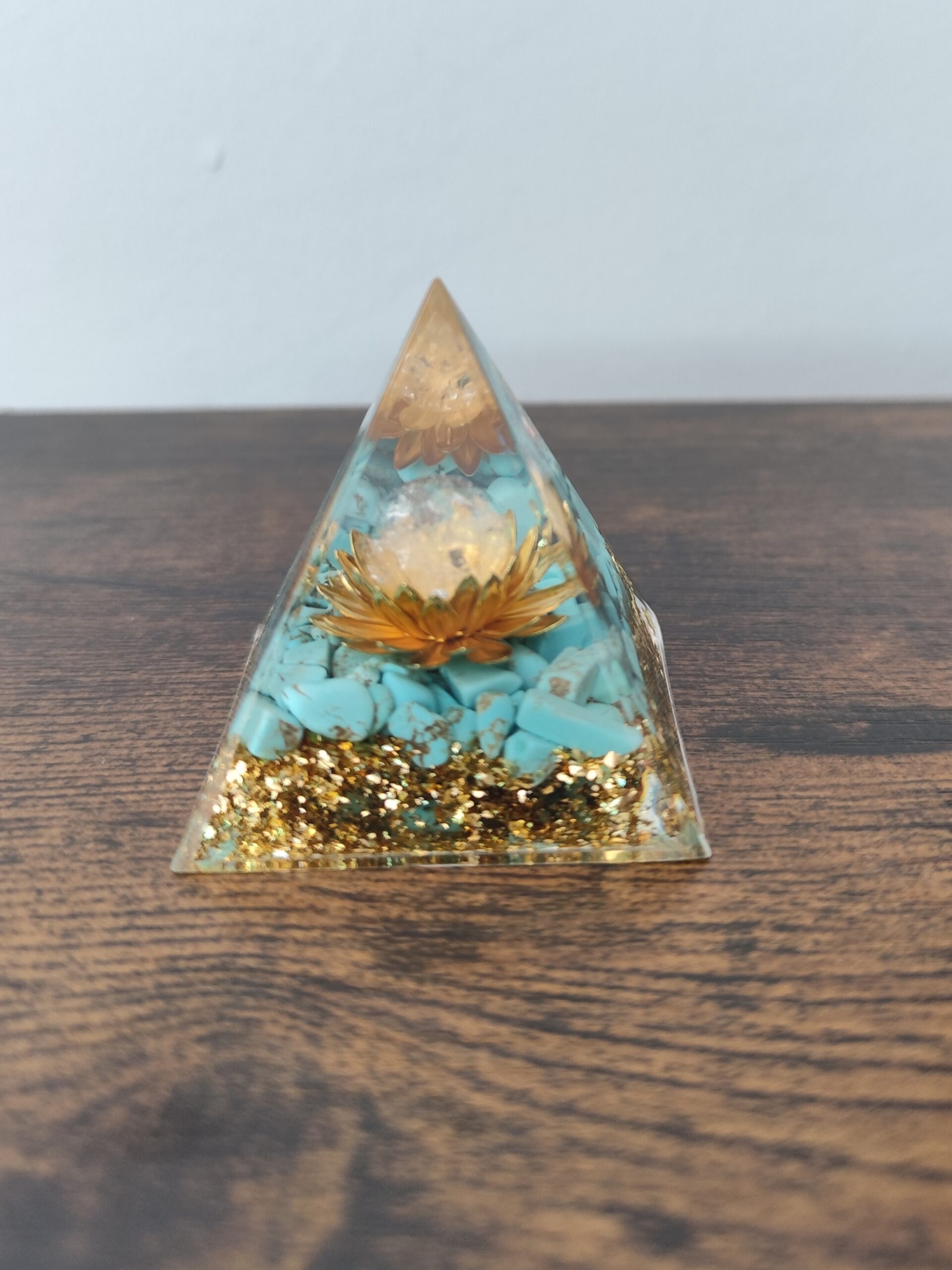 Golden Lotus turquoise orgonite pyramid handmade in resin with natural turquoise and golden details