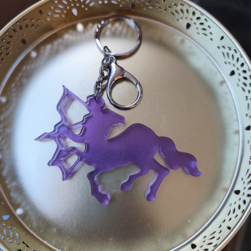 Handmade Sagittarius zodiac Archer keychain in purple epoxy resin