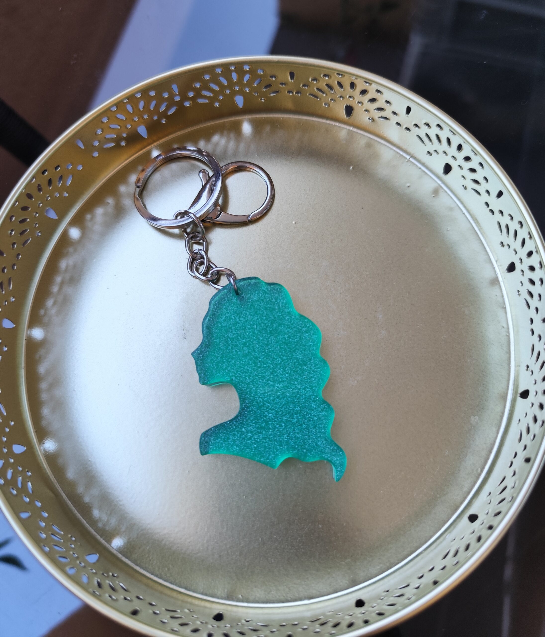 Handmade Virgo zodiac keychain in green epoxy resin with glitter